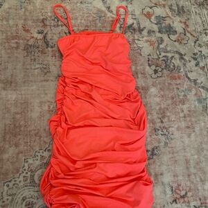 Neon pink mini dress with a built in bra